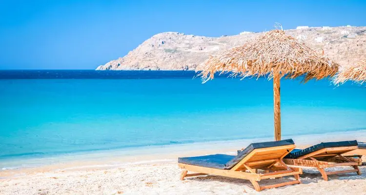 Mykonos beach with umbrella