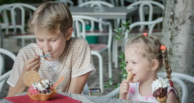 Kids are having ice cream in Florence